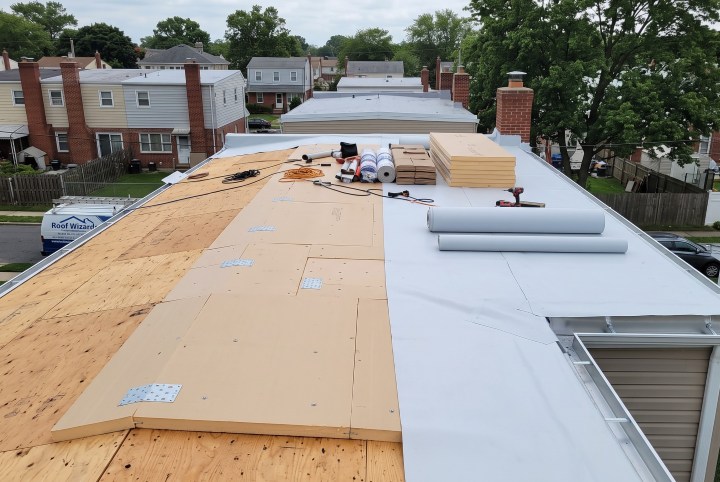 Complete flat roof system installed by Roof Wizards